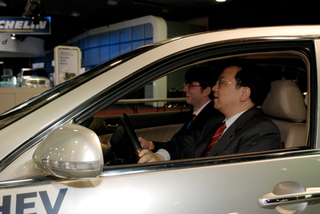 Illustration for article titled Detroit Auto Show: World Exclusive Surreal, Illegal Test Drive Of Chinese Hybrid Through Cobo Arena